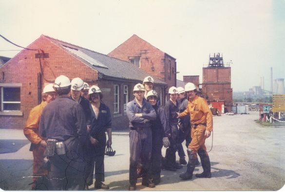 Year 17 ACPMM students emerging from a mine